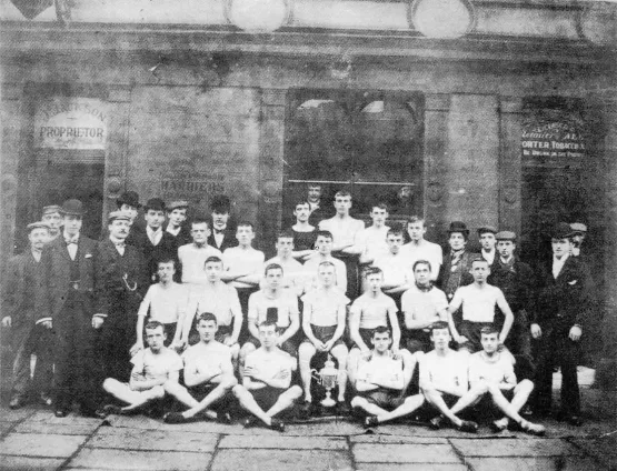 A young Joe seated third from the right with his fellow Bolton Harriers in 1900.