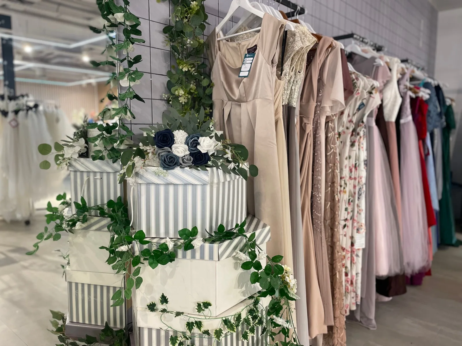 Inside Bolton Hospice’s Reloved boutique in Market Place — racks of bridal gowns, occasion wear and designer dresses